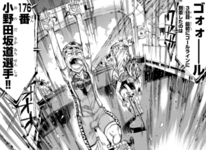 The protagonist crossing the finish line with arms raised